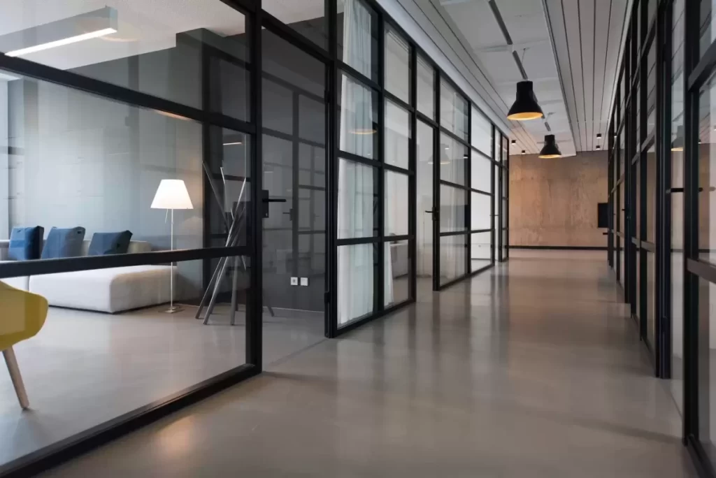 A modern office with sliding glass doors