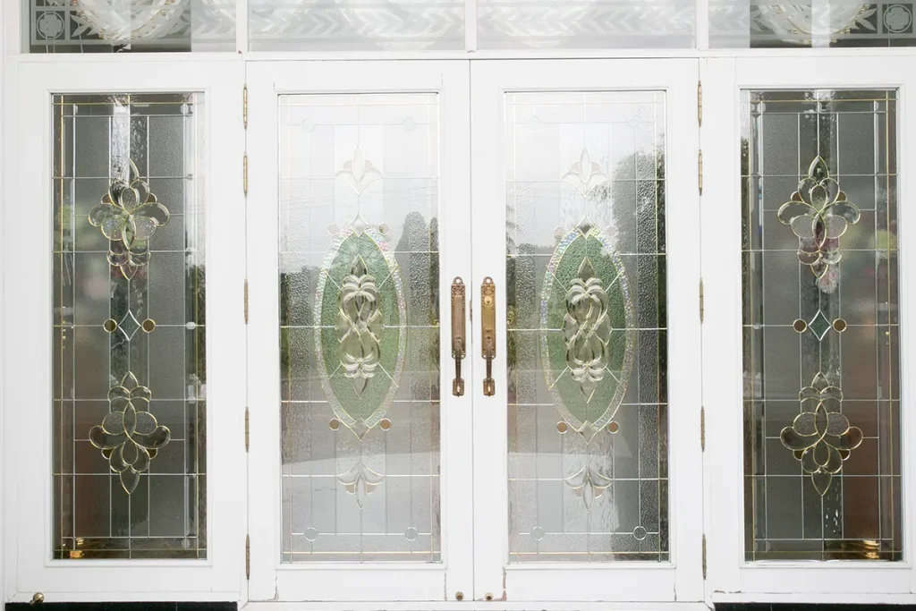 decorative glass doors leading into a house