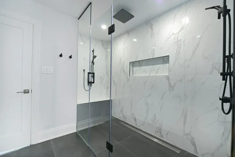 How to install a Glass Block Shower Wall | Community Glass and Mirror A glass shower with marble walls.
